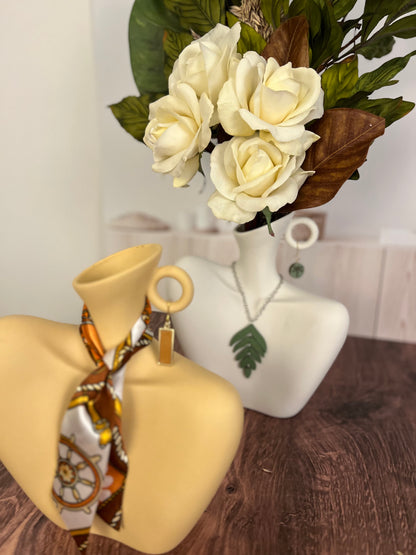 Artificial flower arrangement in a vase. Ceramic centerpiece with real touch roses and preserved florals Flower arrangement for home decor.