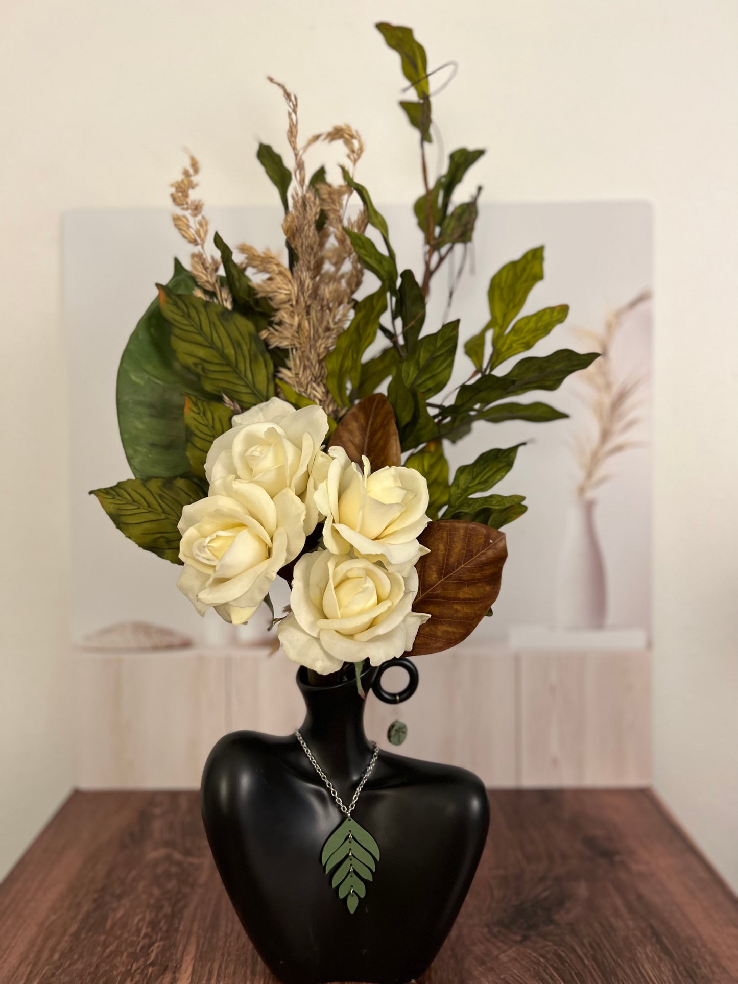 Artificial flower arrangement in a vase. Ceramic centerpiece with real touch roses and preserved florals Flower arrangement for home decor.
