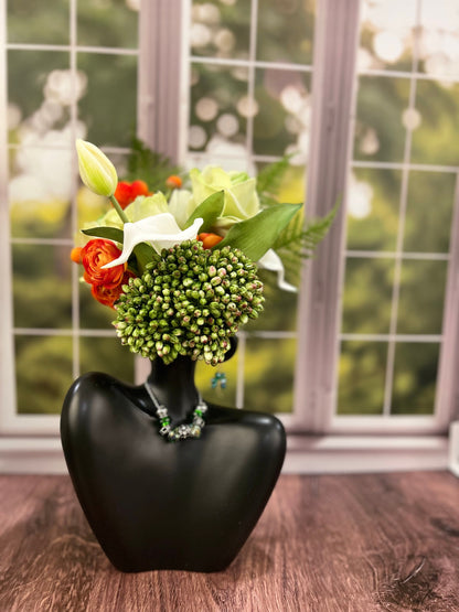 Spring home decor for good luck. Faux floral arrangement. Ceramic centerpiece with real-touch tulips. Faux real touch florals